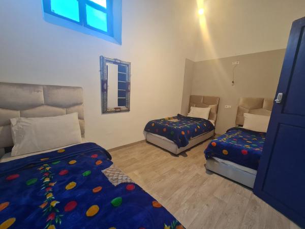 Atlantic Hostel : photo 1 de la chambre chambre triple