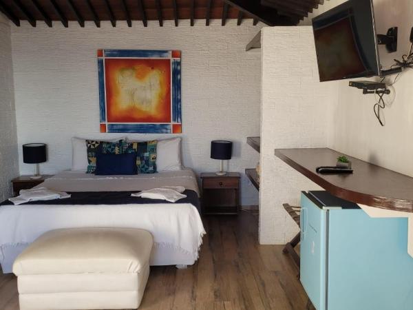 Pousada Vila do Sol : photo 6 de la chambre chambre quadruple avec balcon