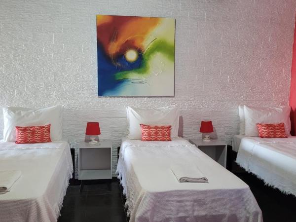 Pousada Vila do Sol : photo 2 de la chambre chambre familiale - vue sur mer