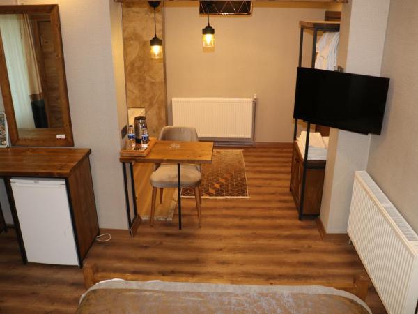 Zengin City Hotel : photo 1 de la chambre suite avec baignoire spa