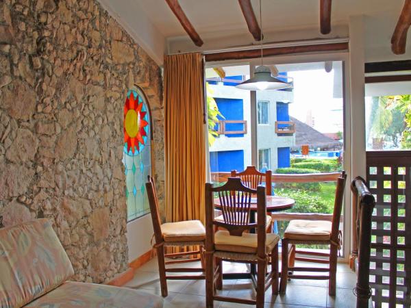 Casa del Mar Cozumel Hotel & Dive Resort : photo 8 de la chambre cabine de luxe avec terrasse - vue sur jardin