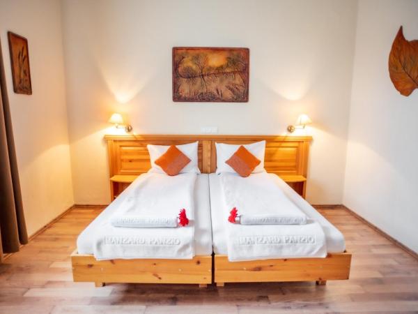 Manzard Panzio : photo 8 de la chambre chambre double ou lits jumeaux