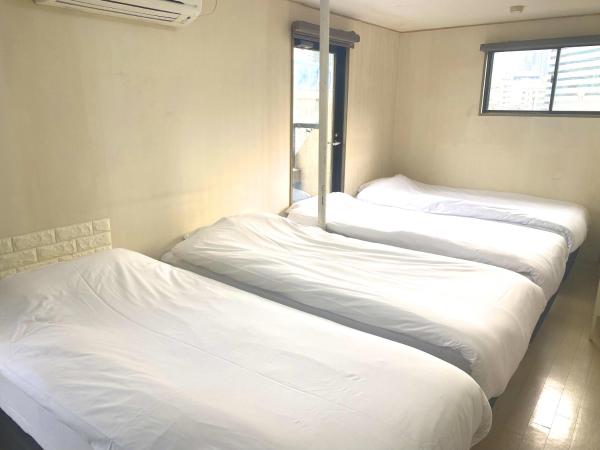 Hotel Empire in Shinjuku : photo 1 de la chambre chambre triple