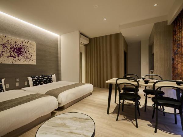 fav HIROSHIMA HEIWAODORI : photo 1 de la chambre chambre lits jumeaux pour personnes à mobilité réduite