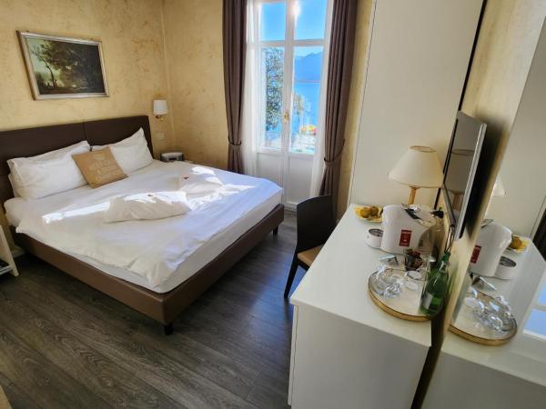 Hotel Millennium : photo 6 de la chambre chambre double supérieure avec balcon et vue sur le lac