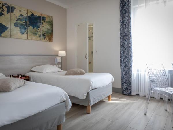 Logis REX HOTEL Lorient : photo 1 de la chambre chambre lits jumeaux