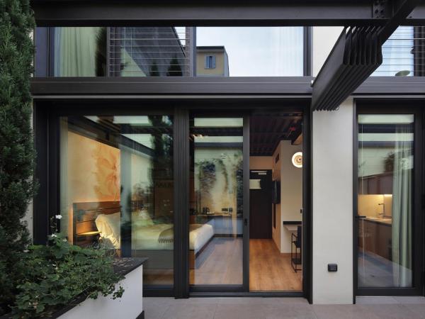 VERSOVERDE HOTEL Alzaia Naviglio Grande : photo 3 de la chambre chambre double ou lits jumeaux supérieure - vue sur jardin