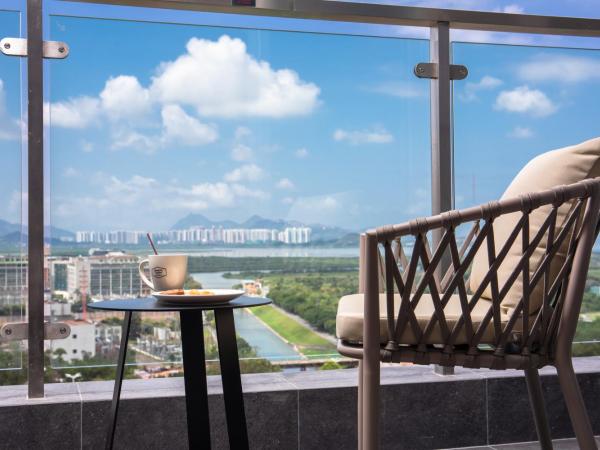 Hampton By Hilton Shenzhen Futian Mangrove Park Apartments : photo 2 de la chambre chambre lit king-size deluxe - vue sur mer