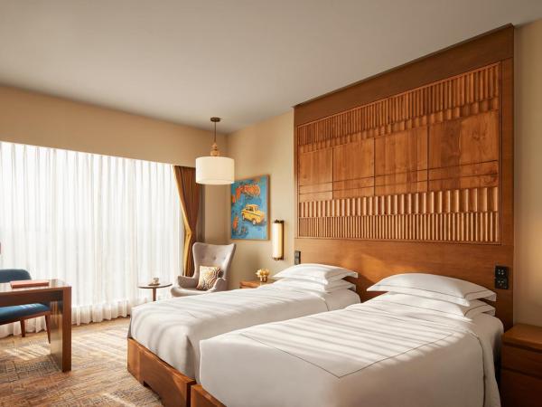Taj City Centre New Town, Kolkata : photo 3 de la chambre deluxe room twin bed with 25% discount on food and beverage & 20% discount on spa treatments