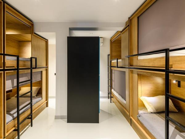 Mosaikon Glostel : photo 1 de la chambre lit simple dans dortoir mixte de 8 lits