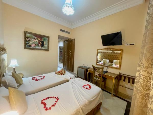 Royal Victoria - Ex British Embassy : photo 2 de la chambre chambre lits jumeaux