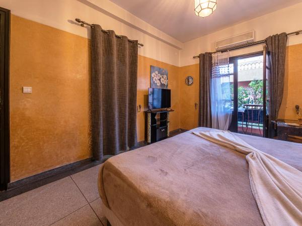 Villa Soraya Hammam & Jacuzzi : photo 10 de la chambre chambre deluxe (2 adultes + 1 enfant)