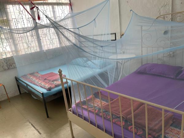 Voyage Home&Guesthouse : photo 4 de la chambre chambre quadruple Économique avec salle de bains commune