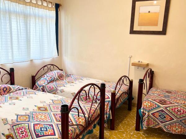 Los Nardos Hostel -pet friendly- : photo 1 de la chambre chambre quadruple
