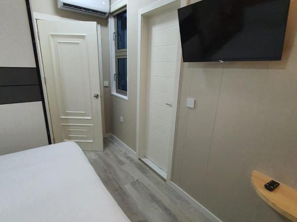 Tourist Inn Grand : photo 4 de la chambre chambre double supérieure