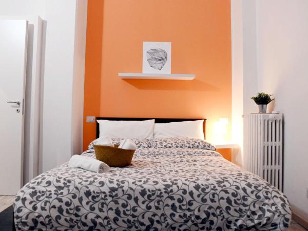 Lucca 22 : photo 1 de la chambre chambre double avec salle de bains commune