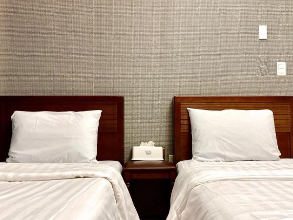 Myeongdong Merlin Hotel : photo 3 de la chambre chambre lits jumeaux deluxe