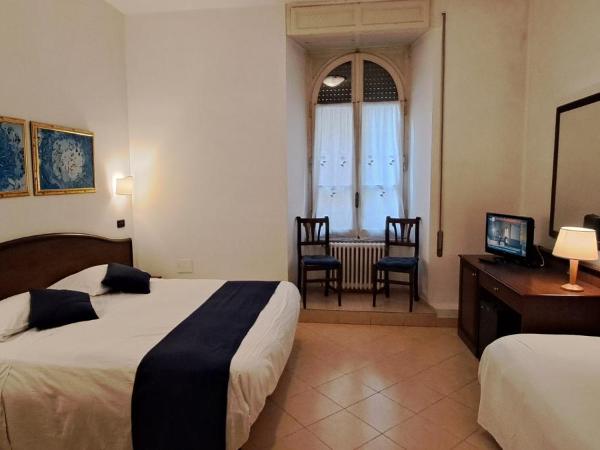 Hotel Bonazzi : photo 1 de la chambre chambre triple
