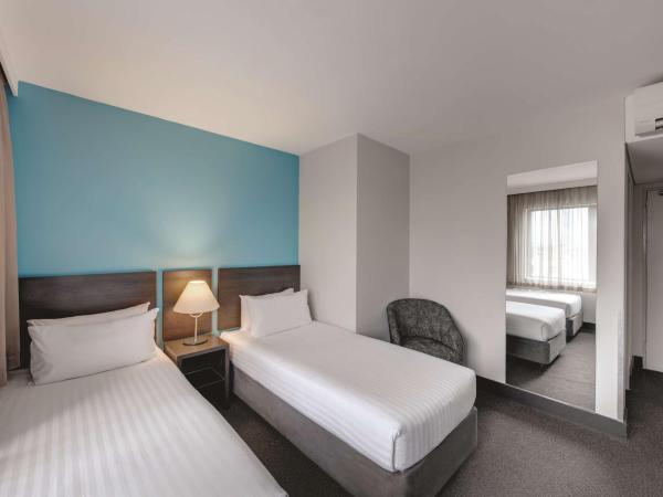 Travelodge Hotel Hobart : photo 3 de la chambre petite chambre lits jumeaux
