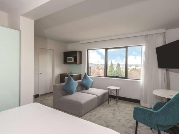 Travelodge Hotel Hobart : photo 1 de la chambre chambre exécutive lit queen-size