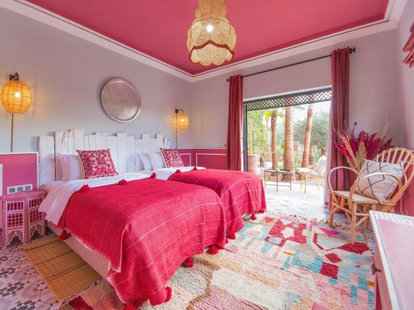 Maison Daouia : photo 1 de la chambre chambre double - vue sur piscine