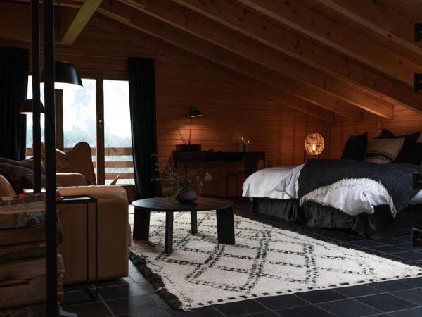 VILLA HUNDERT Boutique Mountainscape : photo 1 de la chambre suite supérieure lit king-size