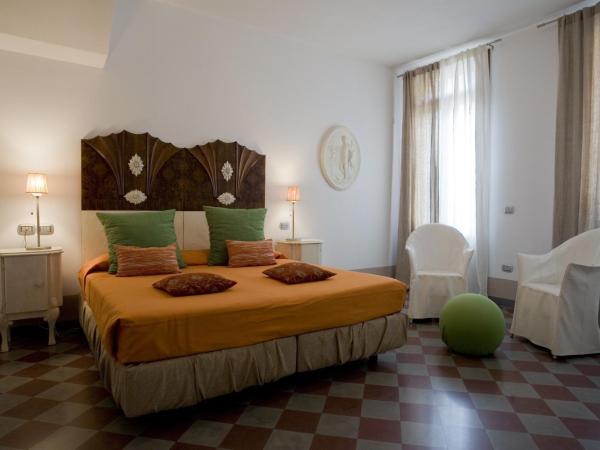 Art Hotel Al Fagiano : photo 1 de la chambre chambre triple