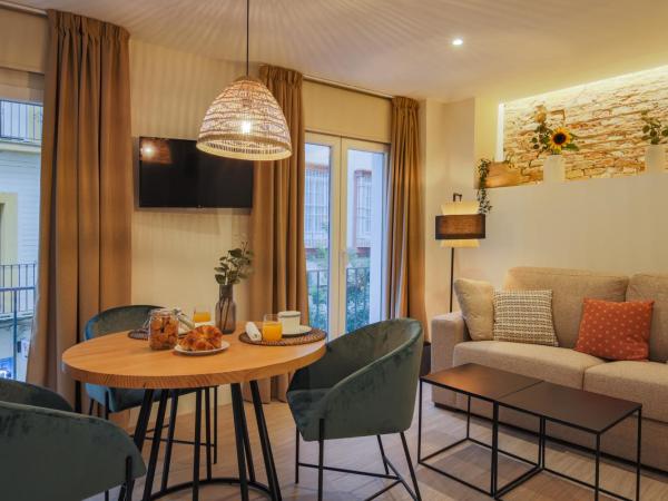 Apartamentos Magna Sevilla : photo 2 de la chambre suite 1 chambre