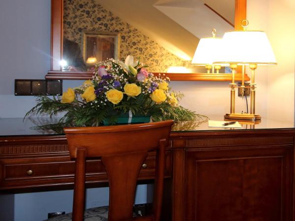 Hotel Conde Ansúrez By Almia Hoteles : photo 1 de la chambre suite deluxe avec baignoire spa