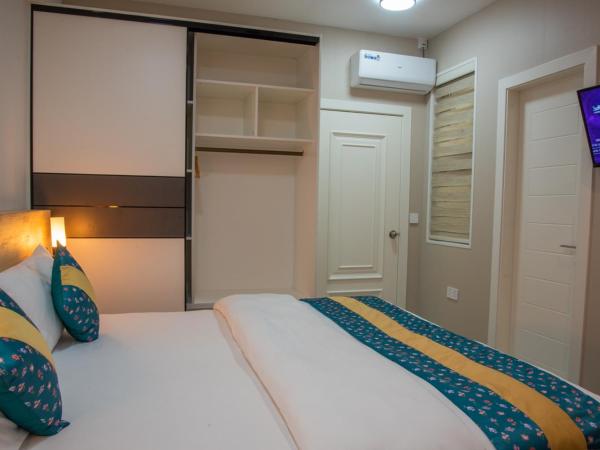 Tourist Inn Grand : photo 8 de la chambre chambre double ou lits jumeaux supérieure