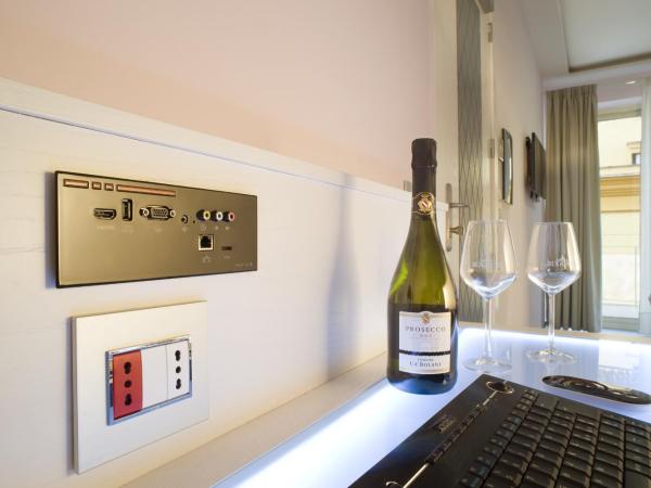 Hotel Tasso Suites & Spa : photo 1 de la chambre chambre double deluxe avec terrasse