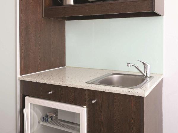 Travelodge Hotel Hobart : photo 6 de la chambre chambre exécutive lit queen-size