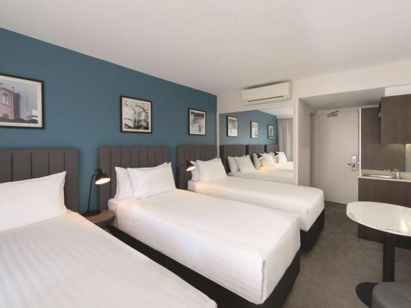 Travelodge Hotel Hobart : photo 1 de la chambre chambre triple