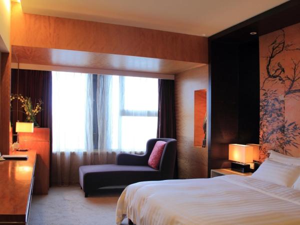 Grand Mercure Dongguan Humen : photo 1 de la chambre chambre lit king-size supérieure
