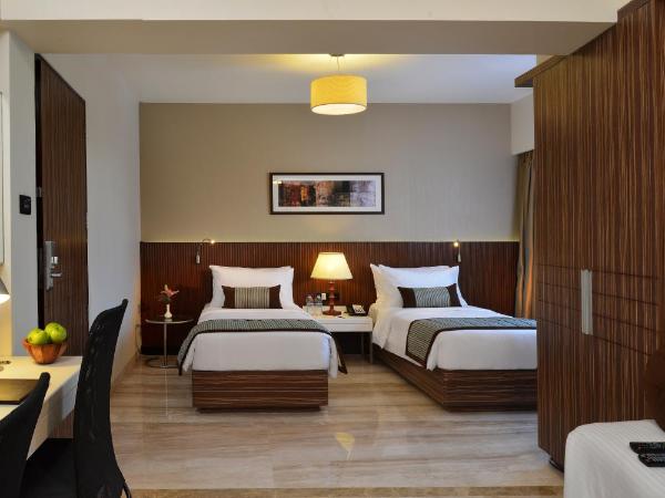 Residency Sarovar Portico : photo 1 de la chambre deluxe room 2 twin beds