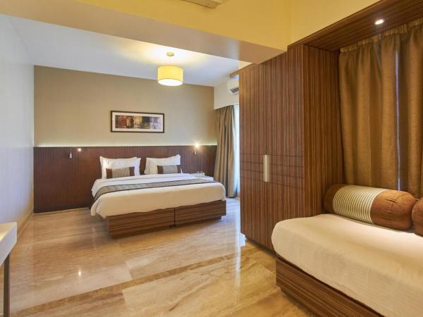 Residency Sarovar Portico : photo 5 de la chambre deluxe room 1 double bed 
