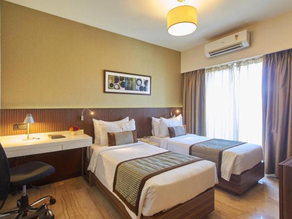 Residency Sarovar Portico : photo 2 de la chambre deluxe room 2 twin beds