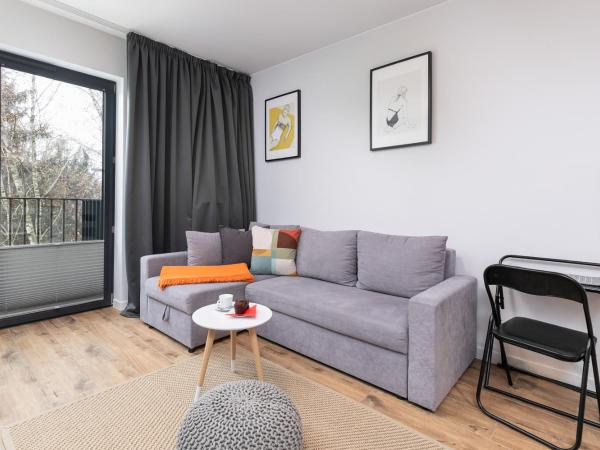 Podczele Seashore SPA & Jacuzzi Apartments with Parking by Noclegi Renters : photo 1 de la chambre appartement avec balcon