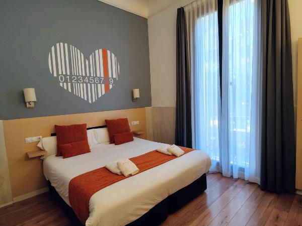 Hostal Live Natura Barcelona : photo 3 de la chambre chambre double ou lits jumeaux