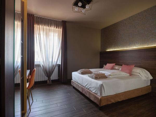 Hotel Giulietta : photo 2 de la chambre suite supérieure lit king-size