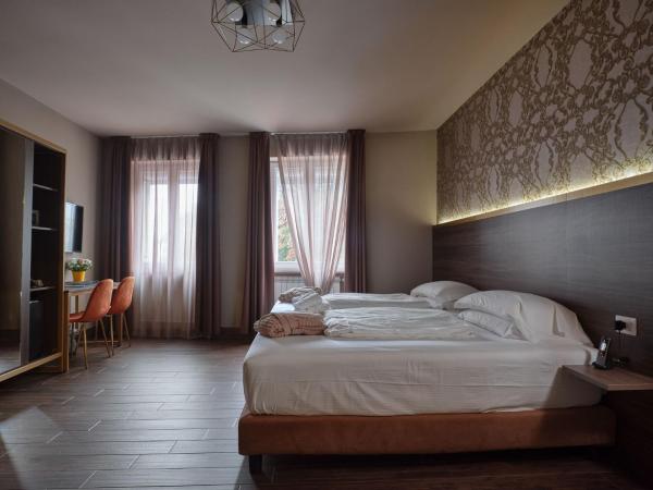 Hotel Giulietta : photo 4 de la chambre suite supérieure lit king-size