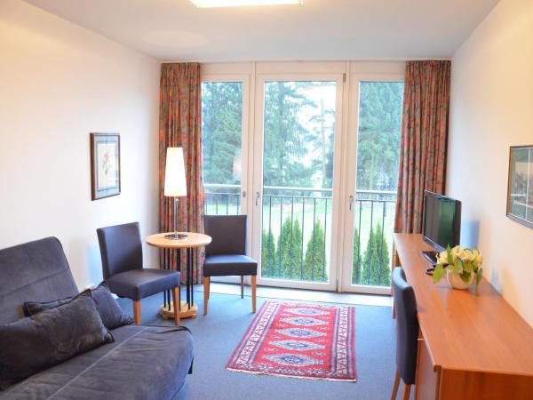 Hotel Alhartinger Hof : photo 2 de la chambre appartement - vue sur jardin