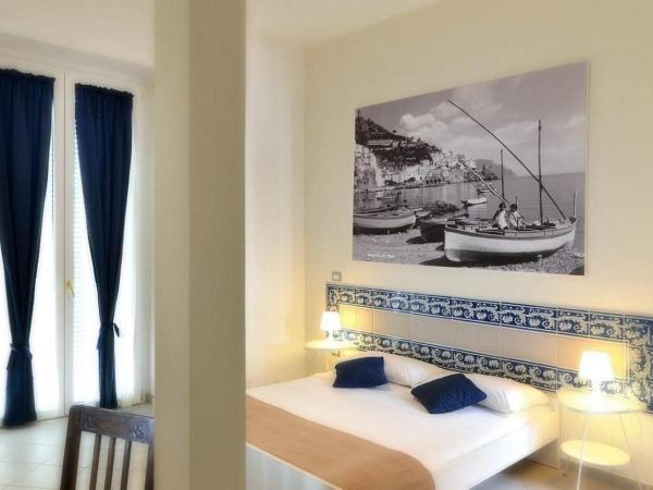 Santi e Saraceni Rooms : photo 8 de la chambre chambre triple avec balcon