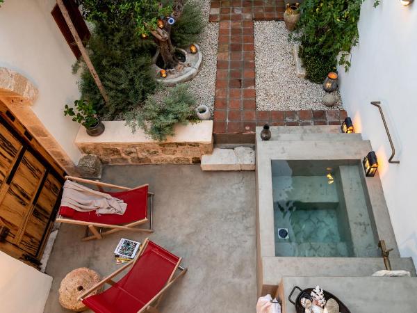 Kókkini Porta Rossa : photo 7 de la chambre suite avec jardin privé et bassin profond - michalis 