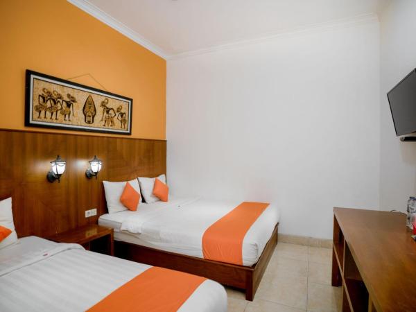 Hotel Poncowinatan - Tugu : photo 1 de la chambre suite familiale