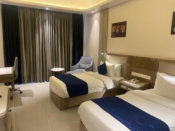 Stardom Resort Jaipur : photo 3 de la chambre chambre lits jumeaux deluxe