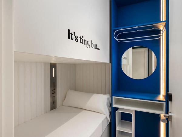 COEO Pod Hostel - Part of COEO Experience : photo 5 de la chambre capsule simple niveau inférieur