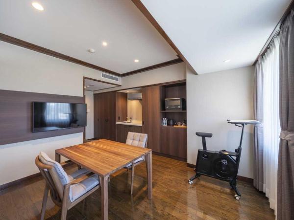 The Saihokukan Hotel : photo 2 de la chambre long stay suite room with kitchenette - south building