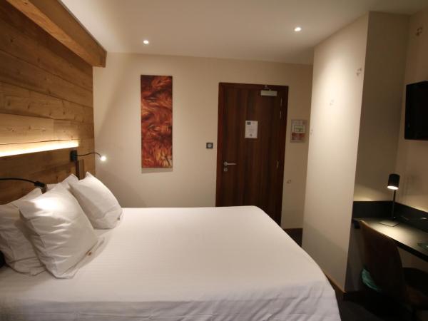 Les Loges Du Parc : photo 10 de la chambre chambre double ou lits jumeaux standard - annexe