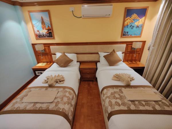 Sherpa Home Hotel : photo 3 de la chambre chambre lits jumeaux avec salle de bains privative séparée